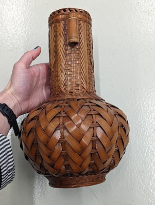 Lot 1023 - A JAPANESE WOVEN BAMBOO IKEBANA VASE