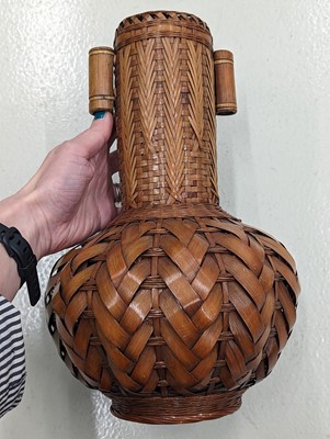 Lot 1023 - A JAPANESE WOVEN BAMBOO IKEBANA VASE