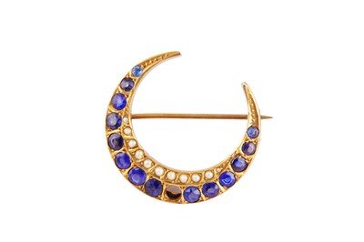 Lot 146 - Edwin Alfred Marsh | A sapphire and pearl crescent brooch, 1903-04