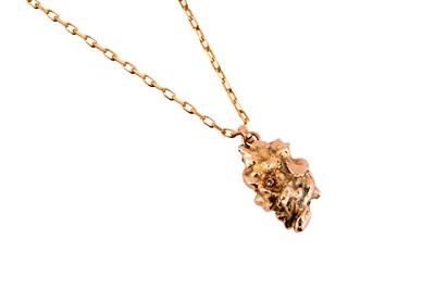 Lot 24 - A DIAMOND AND GOLD NUGGET PENDANT NECKLACE