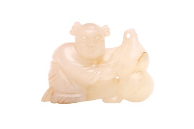 Lot 517 - A CHINESE PALE-CELADON JADE 'BOY' CARVING