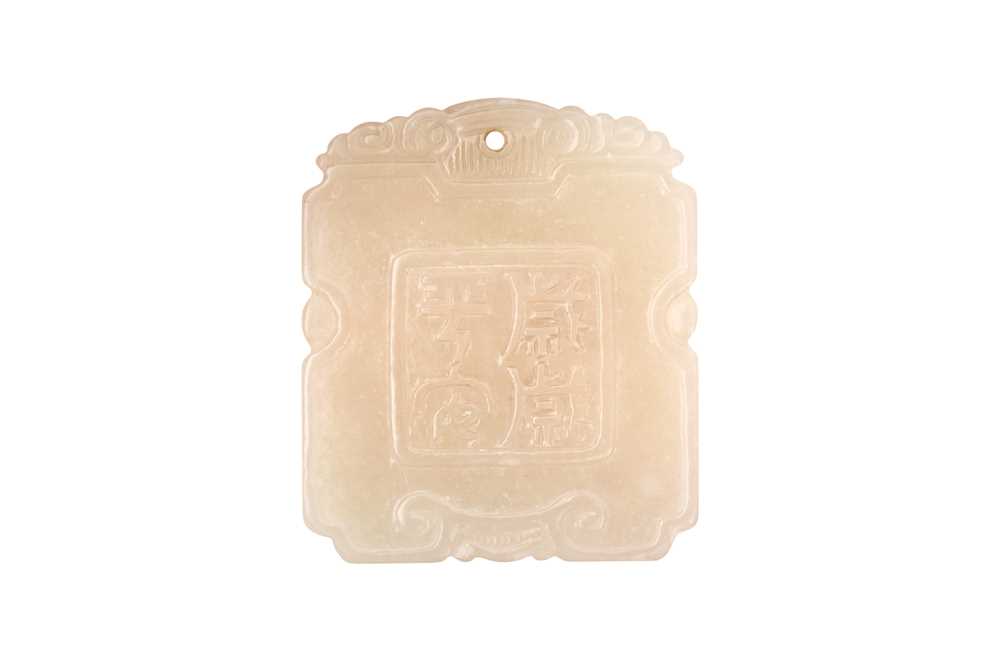 Lot 518 - A CHINESE PALE-CELADON AND RUSSET JADE 'QUAIL' PLAQUE