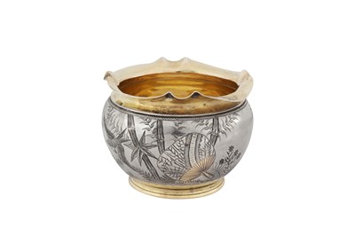 Lot 392 - A Victorian ‘aesthetic movement’  parcel gilt sterling silver sugar bowl, London 1882 by George Foxctorian parcel gilt silver ‘aesthetic movement’ sugar bowl, London 1882 by George Fox