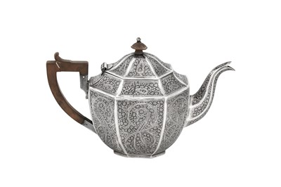 Lot 107 - An early 20th century Anglo – Indian unmarked silver teapot, Kashmir circa 1910
