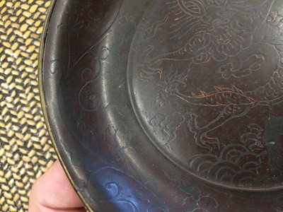 Lot 519 - A CHINESE BROWN LACQUER ‘DRAGON’ DISH