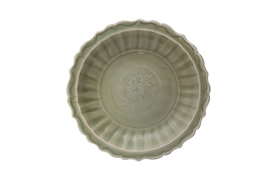 Lot 606 - A CHINESE LONGQUAN CELADON 'PEONY' CHARGER
