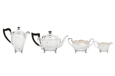 Lot 377 - An assembled Edwardian sterling silver four-piece tea and coffee service, the majority Sheffield 1903 by Levesley Brothers