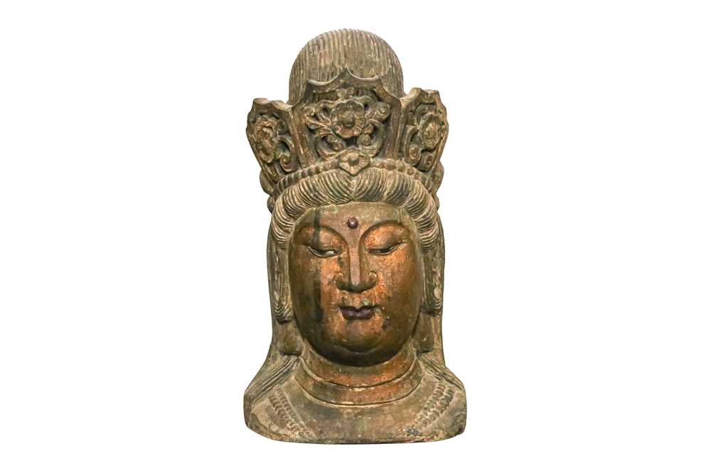 Lot 561 - A CHINESE PAINTED WOOD HEAD OF GUANYIN