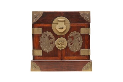 Lot 570 - A CHINESE BRASS-BOUND WOOD TABLETOP CABINET