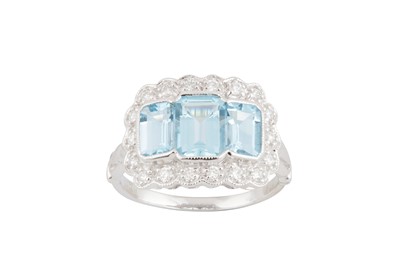Lot 65 - An aquamarine and diamond dress ring