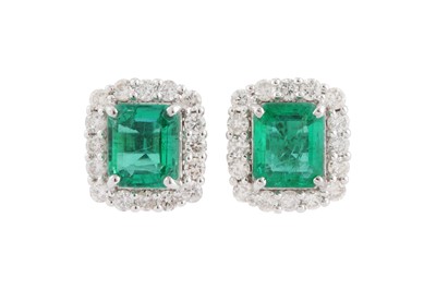 Lot 45 - A pair of emerald and diamond earstuds