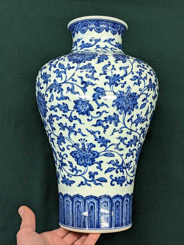 Lot 918 - A CHINESE BLUE AND WHITE 'LOTUS SCROLL' VASE
