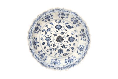 Lot 875 - A CHINESE BLUE AND WHITE 'FOLIATE SCROLL' DISH