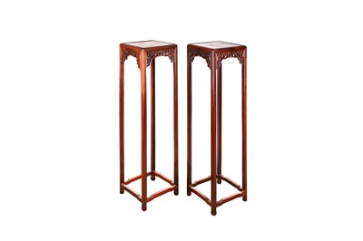 Lot 567 - A PAIR OF TALL CHINESE HARDWOOD STANDS