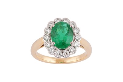 Lot 201 - An emerald and diamond cluster ring