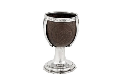 Lot 439 - A George III Scottish provincial silver mounted coconut cup, Glasgow circa 1770 by Adam Graham (active 1763-1818)