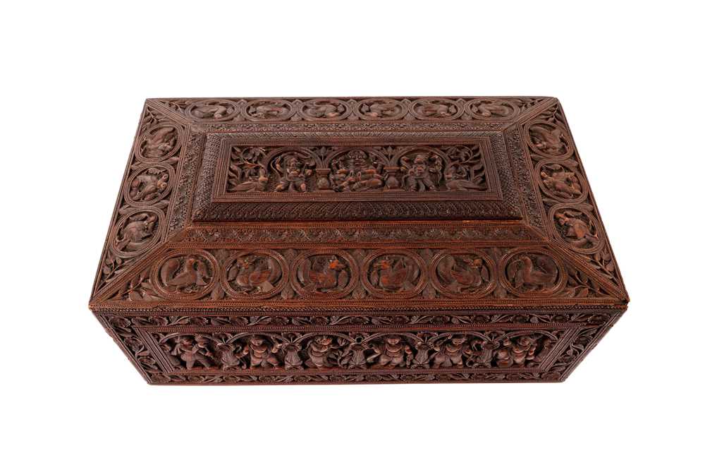 Lot 249 - A FINELY CARVED SANDALWOOD BOX WITH VISHNU'S