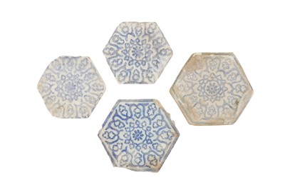 Lot 132 - FOUR TIMURID BLUE AND WHITE POTTERY HEXAGONAL TILES