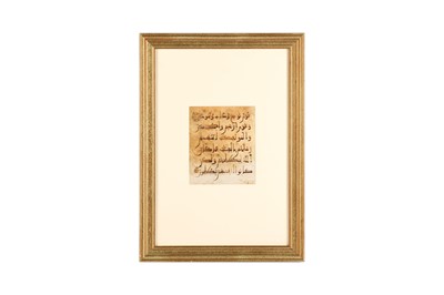 Lot 123 - A LOOSE FOLIO FROM A MAGHRIBI QUR'AN