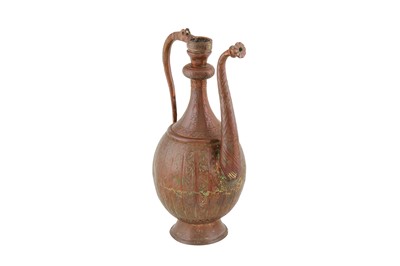 Lot 157 - A SAFAVID-STYLE TINNED COPPER EWER