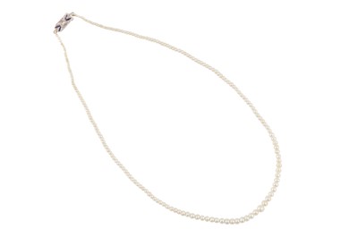 Lot 66 - A pearl necklace with a diamond clasp