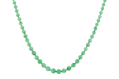 Lot 73 - A jade necklace with a diamond clasp