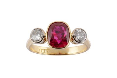 Lot 14 - A ruby and diamond three-stone ring