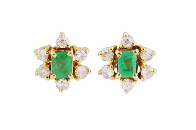 Lot 202 - A pair of emerald and diamond cluster earstuds