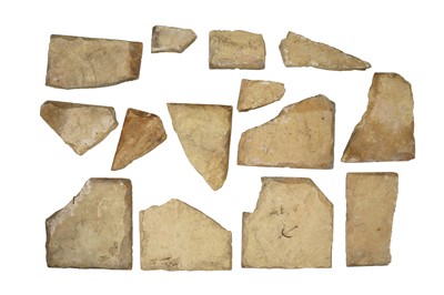 Lot 228 - FIFTEEN FRAGMENTS OF SAFAVID CUERDA SECA POTTERY TILES