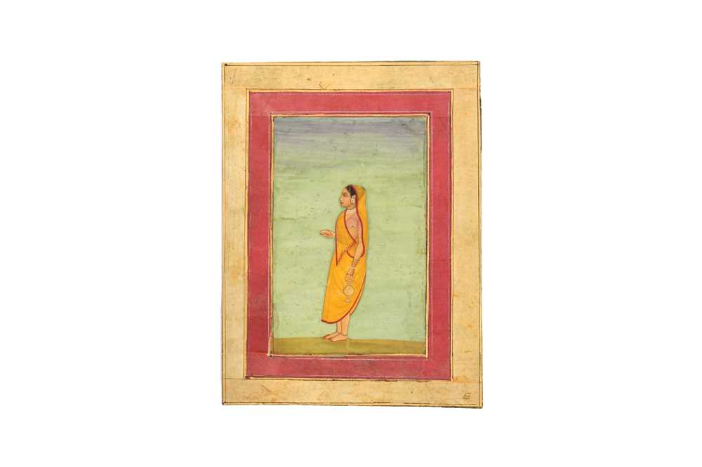 Lot 321 - A STANDING PORTRAIT OF AN INDIAN MAIDEN GOING TO PERFORM PUJA