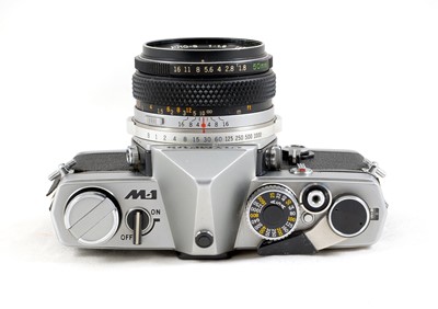 Lot 81 - A Rare Olympus M-1 SLR with 50mm M-System Lens.