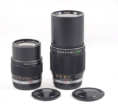 Lot 84 - A Pair of Olympus M-System "Silver Nose" Telephoto Lenses.