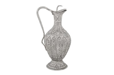 Lot 103 - A late 19th century Anglo – Indian silver-plated copper claret jug, Kashmir circa 1880