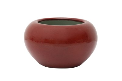 Lot 875 - A CHINESE RED-GLAZED ALMS BOWL