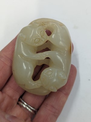 Lot 720 - A GROUP OF THREE CHINESE CELADON JADE CARVINGS