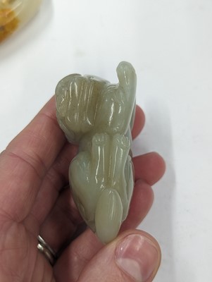 Lot 720 - A GROUP OF THREE CHINESE CELADON JADE CARVINGS