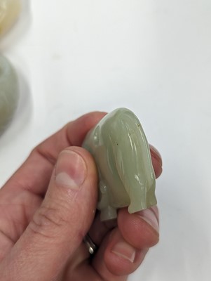 Lot 720 - A GROUP OF THREE CHINESE CELADON JADE CARVINGS