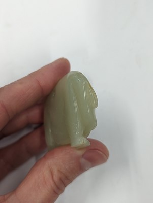 Lot 720 - A GROUP OF THREE CHINESE CELADON JADE CARVINGS