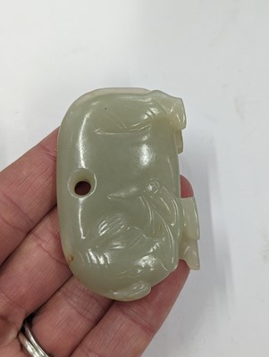 Lot 720 - A GROUP OF THREE CHINESE CELADON JADE CARVINGS