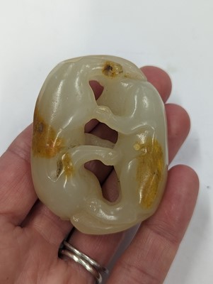 Lot 720 - A GROUP OF THREE CHINESE CELADON JADE CARVINGS