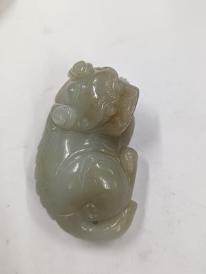 Lot 720 - A GROUP OF THREE CHINESE CELADON JADE CARVINGS