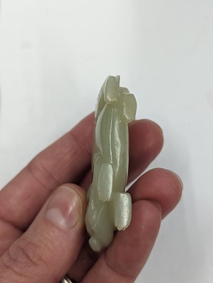 Lot 720 - A GROUP OF THREE CHINESE CELADON JADE CARVINGS