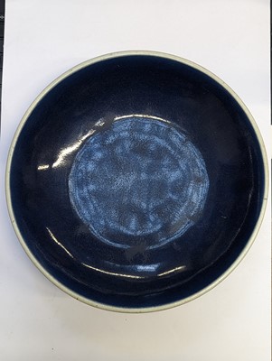 Lot 128 - A CHINESE MONOCHROME BLUE-GLAZED DISH