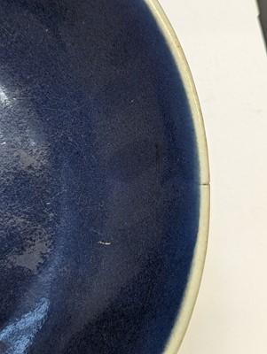 Lot 128 - A CHINESE MONOCHROME BLUE-GLAZED DISH