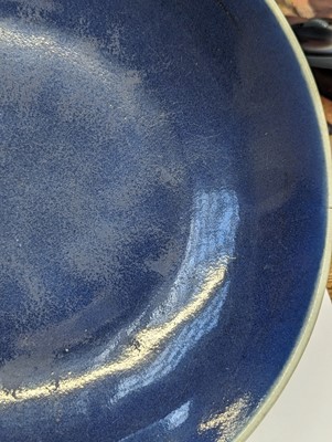 Lot 128 - A CHINESE MONOCHROME BLUE-GLAZED DISH