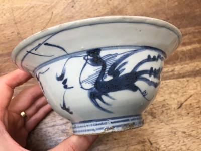 Lot 602 - A CHINESE BLUE AND WHITE 'DRAGON AND PHOENIX' KLAPMUTS BOWL
