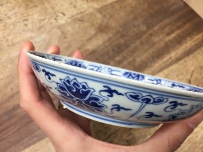 Lot 127 - A CHINESE BLUE AND WHITE 'LOTUS SCROLL' DISH