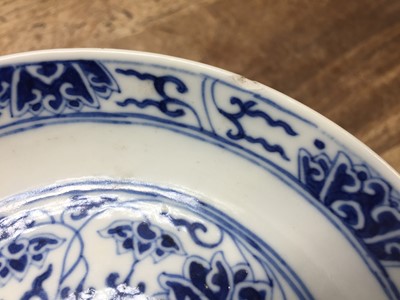 Lot 127 - A CHINESE BLUE AND WHITE 'LOTUS SCROLL' DISH