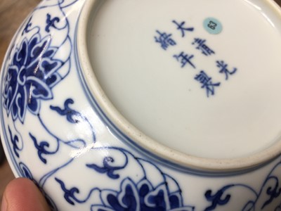 Lot 127 - A CHINESE BLUE AND WHITE 'LOTUS SCROLL' DISH