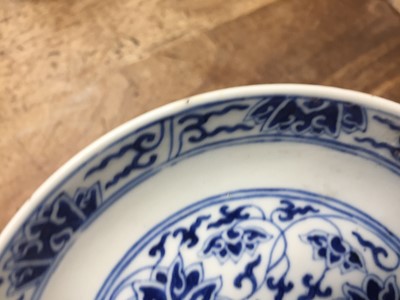 Lot 127 - A CHINESE BLUE AND WHITE 'LOTUS SCROLL' DISH